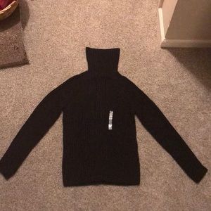 Black turtle neck sweater